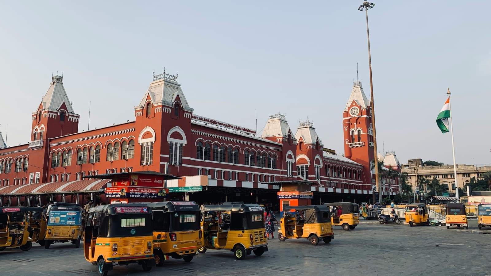 Chennai Central railway station with yellow auto rickshaws